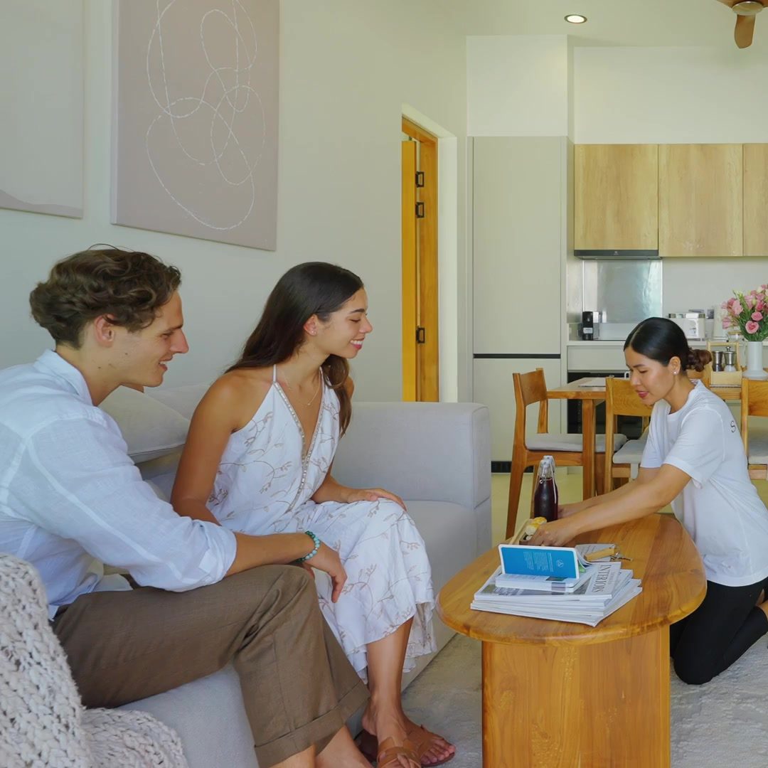 A Staylar concierge welcoming guests in their villa