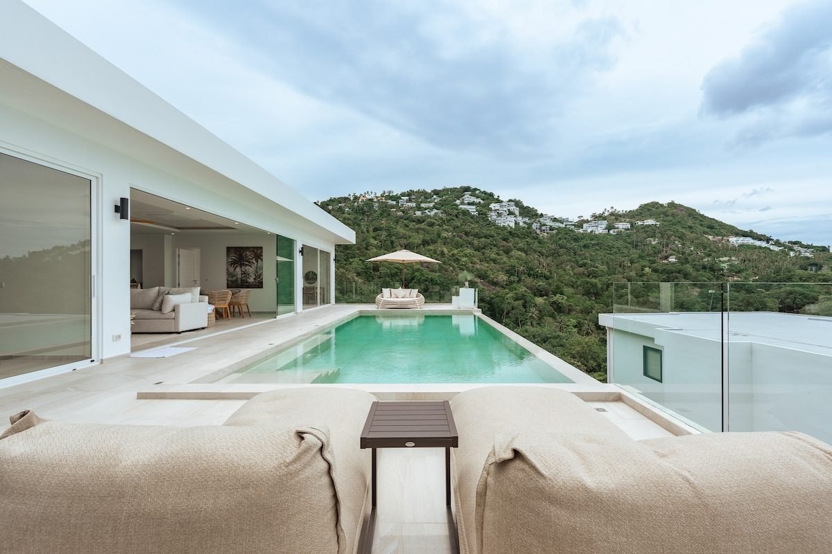 Pool terrace at Coral Cove looking over the hills to the sea